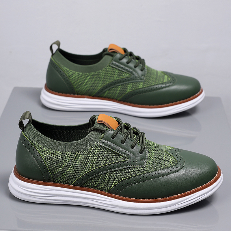 Pair of men's mesh leather trainers from a front angle with lace-up fastening