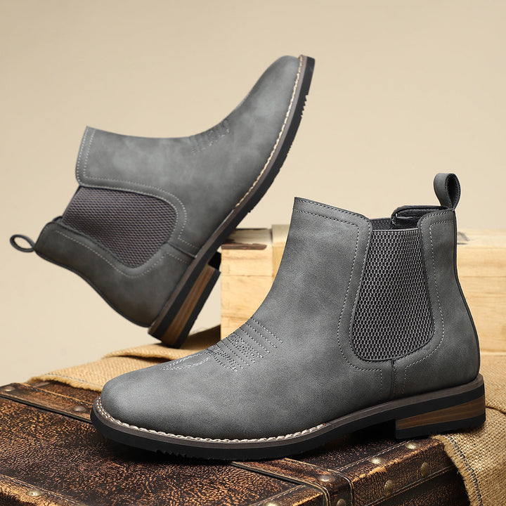 Pair of men’s leather boots styled for everyday wear