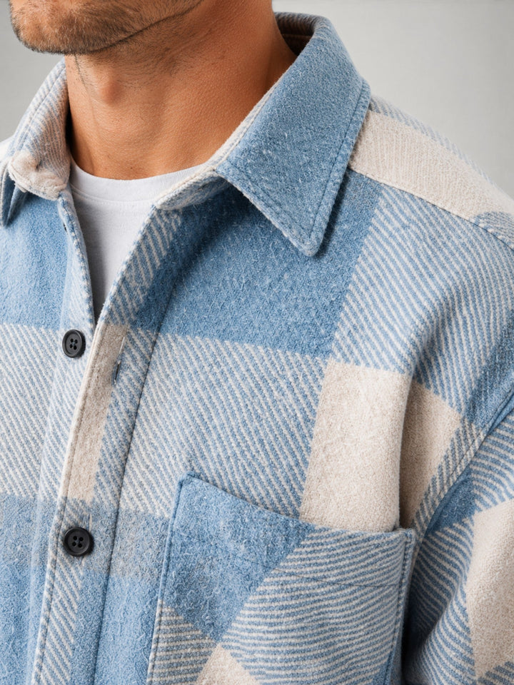 Close-up of the checked flannel fabric and button-up front