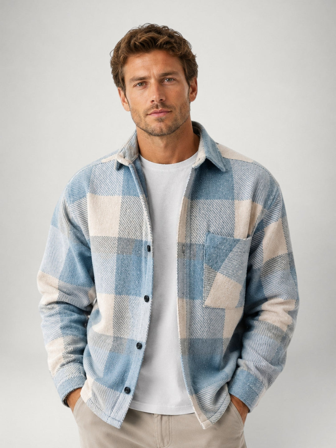 Men's checked flannel shirt with long sleeves shown from the front