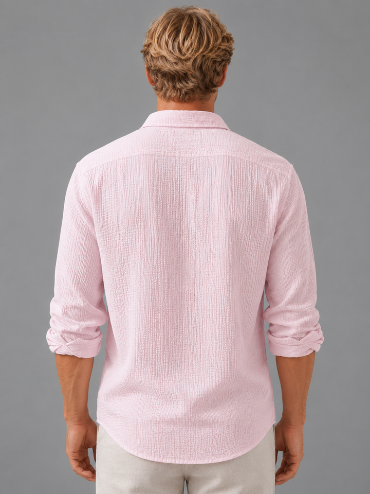 Back view of men's textured button-up shirt with relaxed silhouette