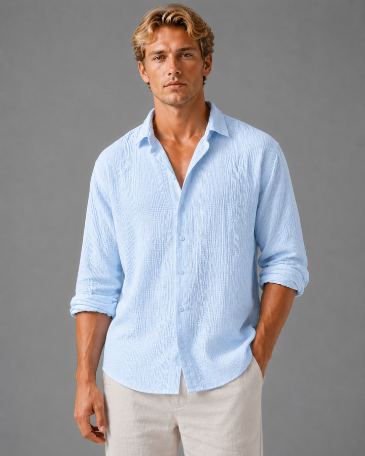 Close-up of textured fabric on men's button-up summer shirt