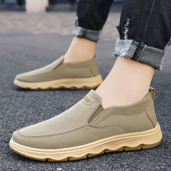 Side view of casual men's slip-on canvas trainers