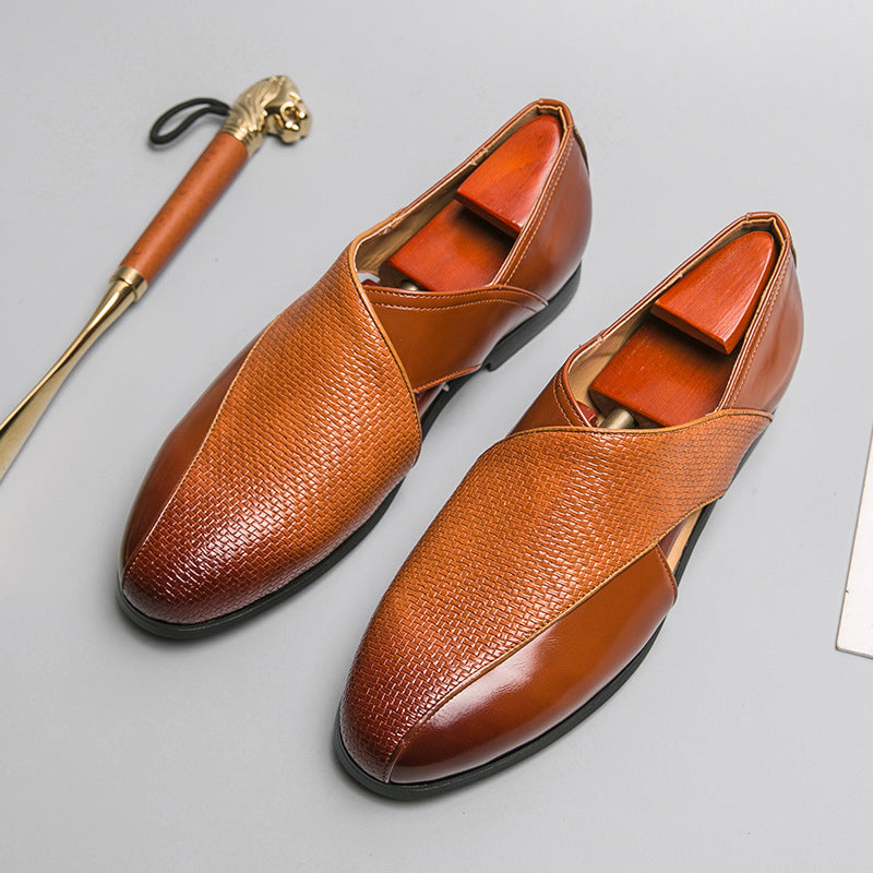 Close-up of woven leather cross-strap detail on men's loafers