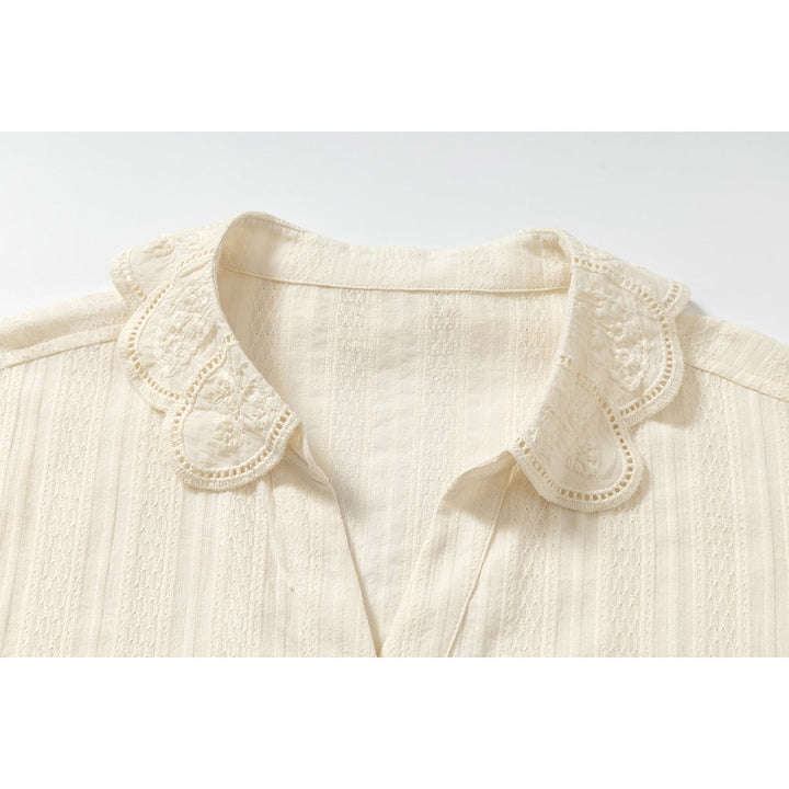 Men's cream short sleeve shirt styled on a model from the front