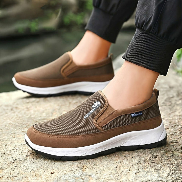 Close-up of the cushioned footbed inside men's trainers