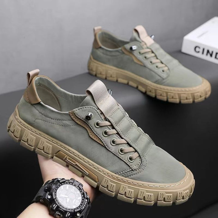 Close-up of men's canvas trainers highlighting the tread sole