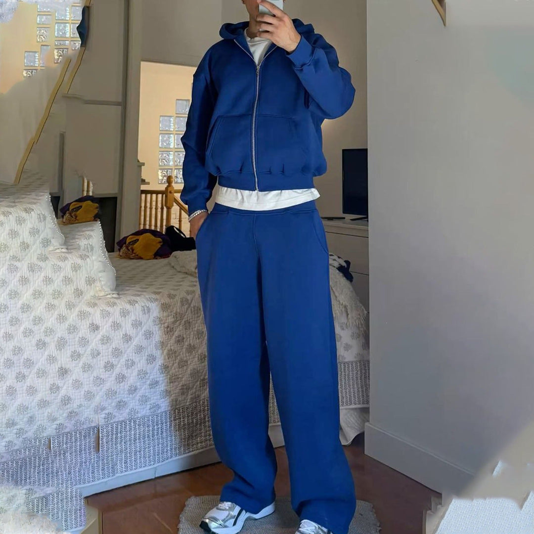 Complete men's hoodie and sweatpants set styled for casual wear