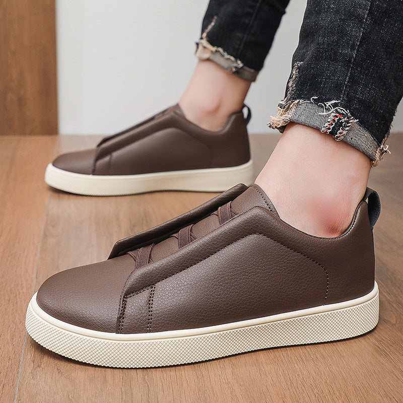 Pair of men's leather lace-up trainers viewed from above