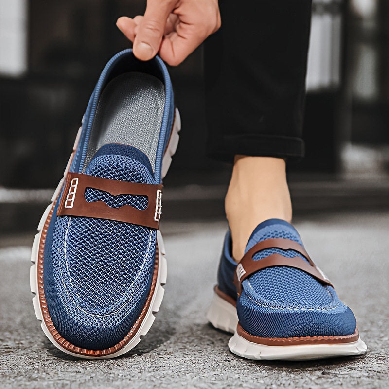 Side profile of a men's mesh loafer with a low everyday sole