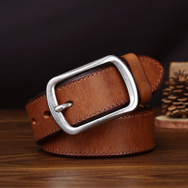 Close-up of the men's vintage jeans belt and textured finish