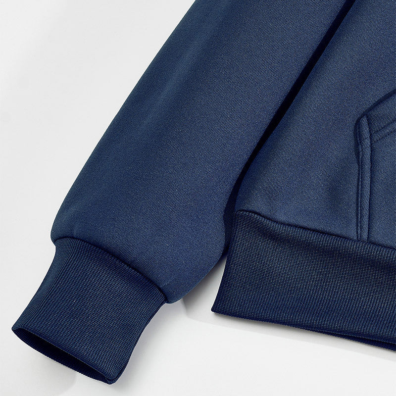 Men's hoodie showing textured contrast panels on the front