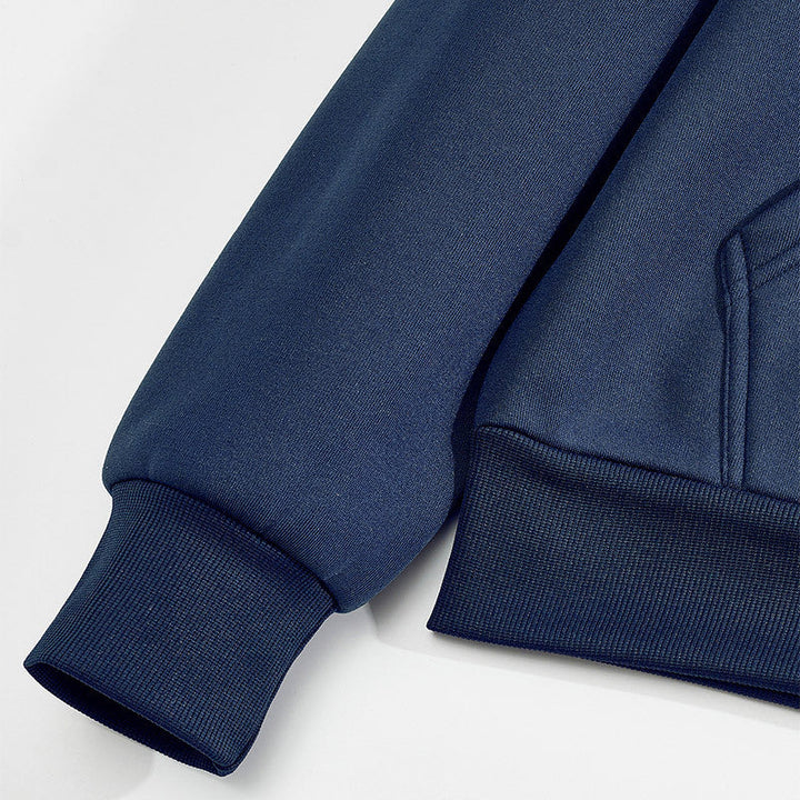 Men's hoodie showing textured contrast panels on the front