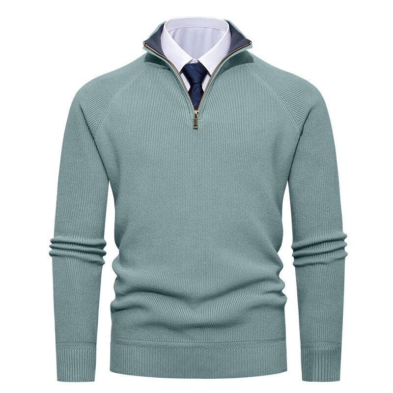 Close-up of the half-zip fastening on the ribbed jumper