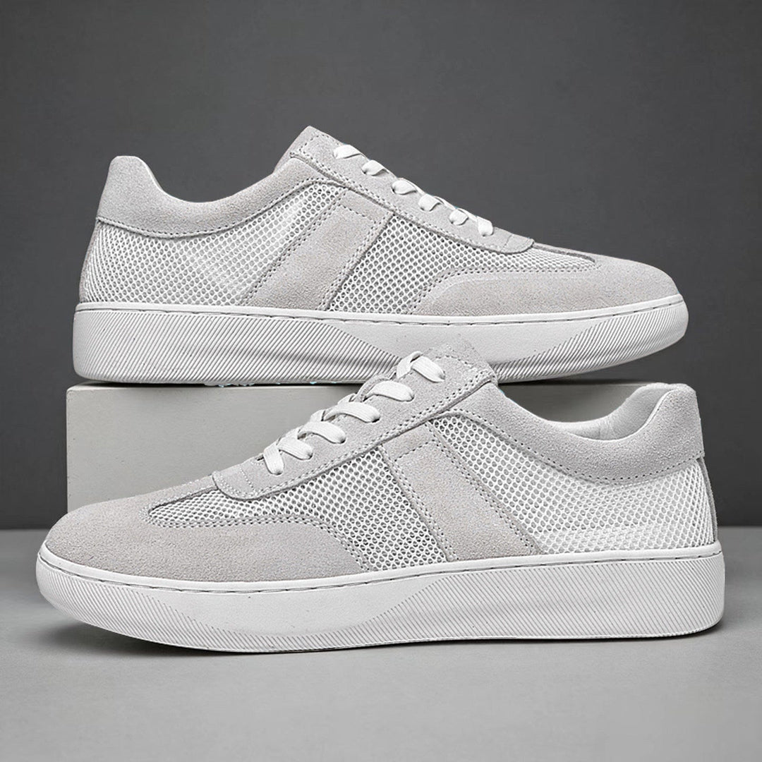 Men's cobalt mesh suede sneaker showing sole detail