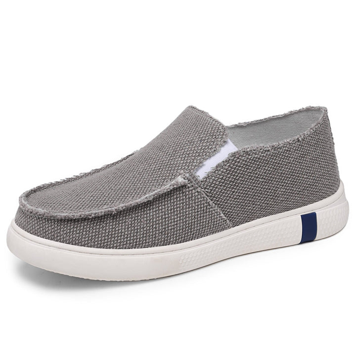 Close-up of the frayed canvas edge on the slip-on shoes