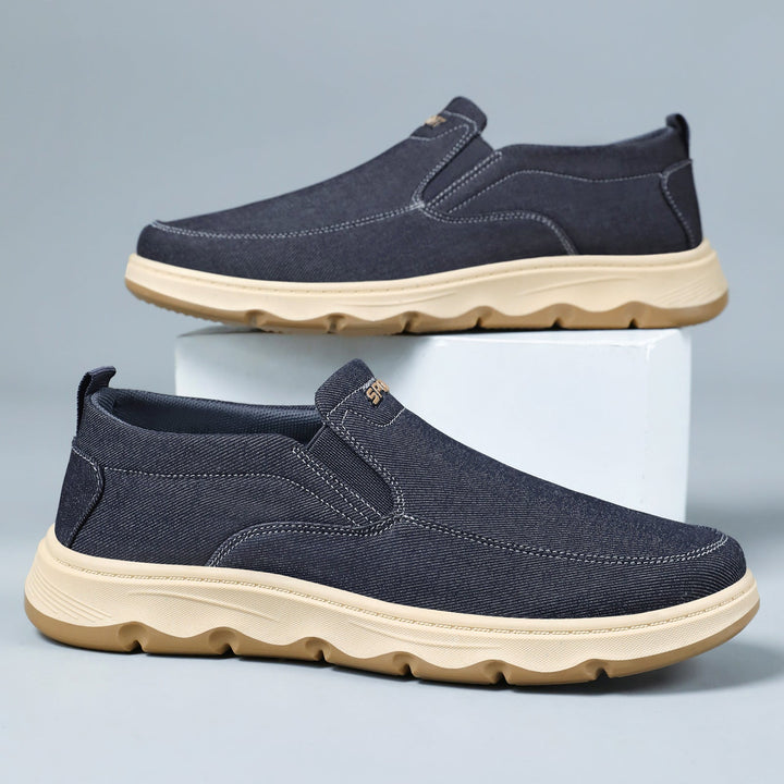 Men's lightweight canvas slip-on trainers shown from the side