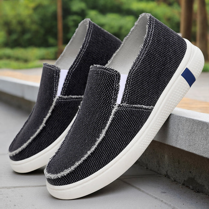 Side view of men’s casual canvas slip-on shoes