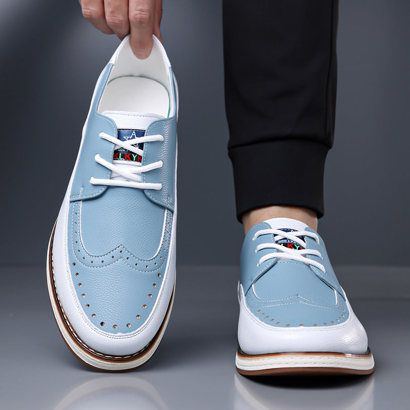 Rear view of men's two-tone brogue leather shoes with stacked heel