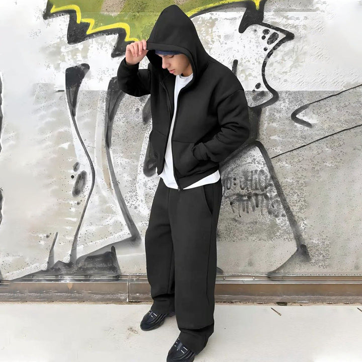 Men's zip hoodie showing its oversized fit and full front fastening