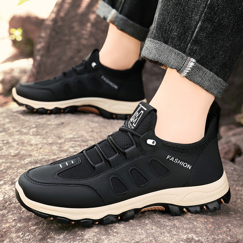 Side view of men's outdoor trail trainers with breathable detailing