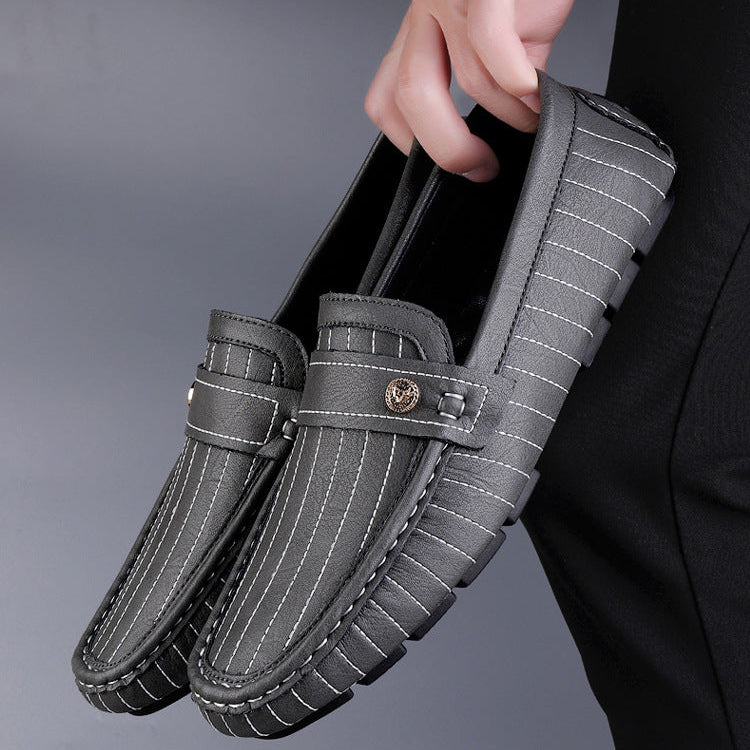 Pair of men's leather loafers angled to show shape and finish