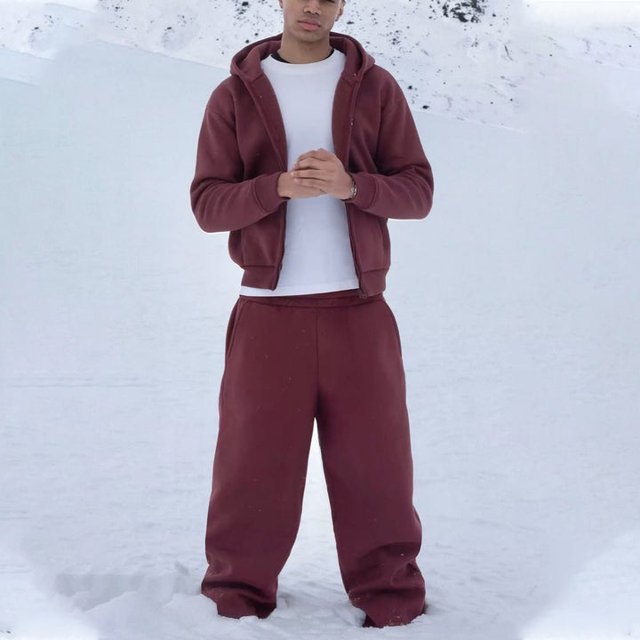 Men's oversized zip hoodie and relaxed sweatpants set displayed together