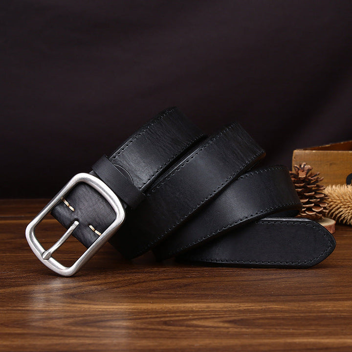 Detail view of the belt buckle and classic jeans belt design