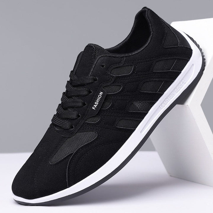 Men's suede sneakers shown at an angled view