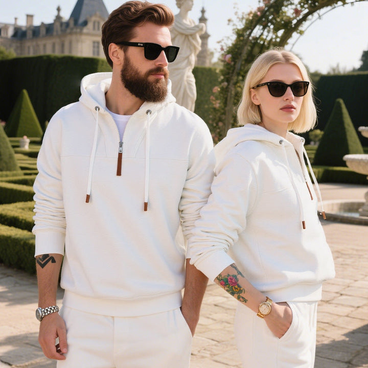 Front view of a men's fleece hoodie with a half-zip fastening