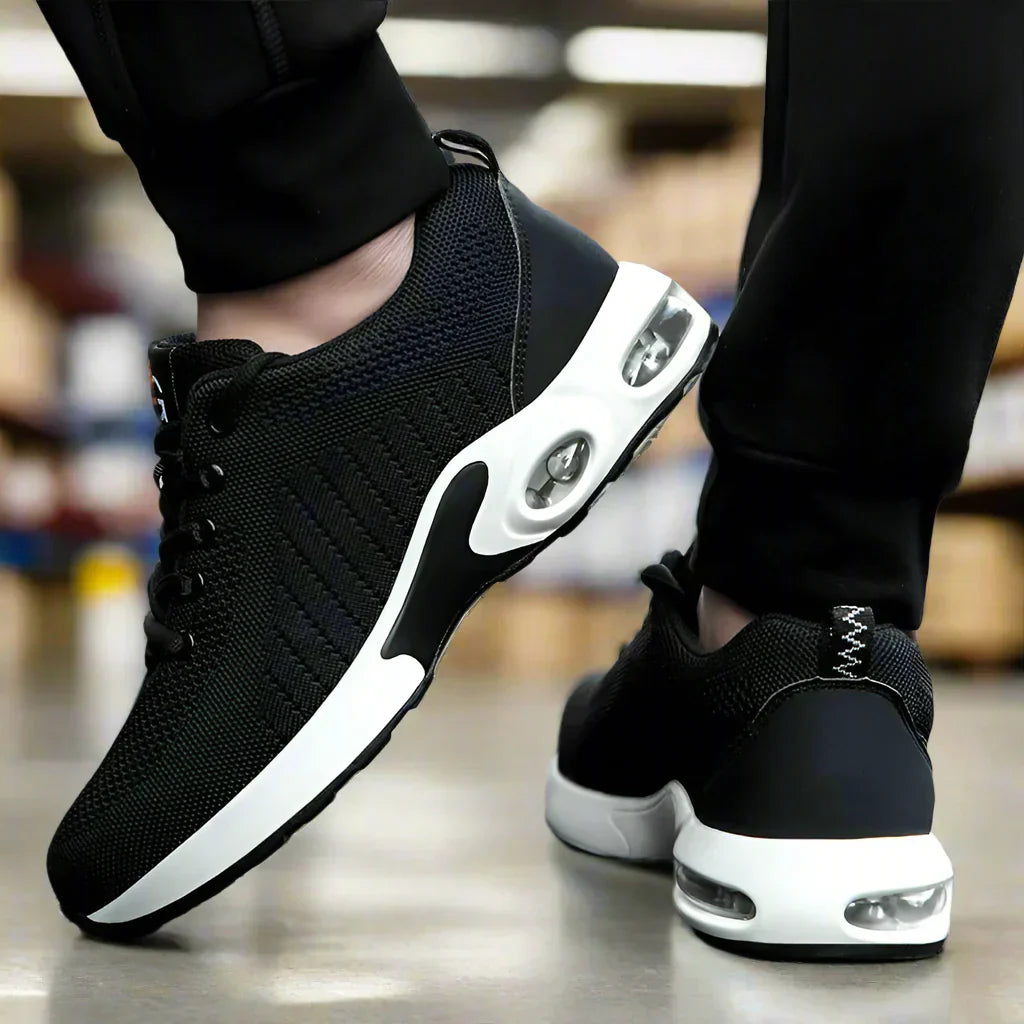 Angled view of men's protective work shoes with streamlined design