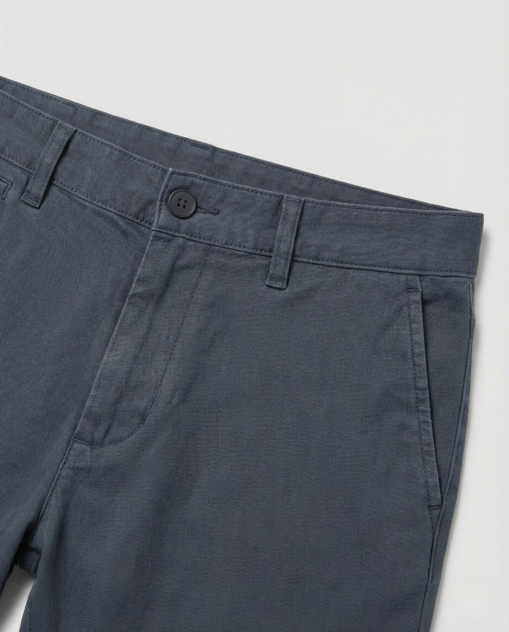 Side view of men's fleece-lined tapered chinos