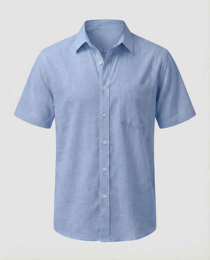 Men's linen shirt showing relaxed fit through the body and shoulders