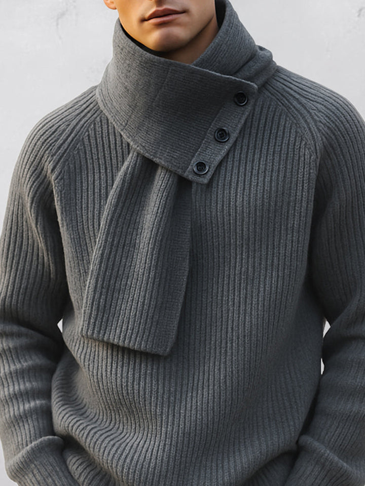 Men's knitted jumper showing the detachable scarf and raglan sleeves