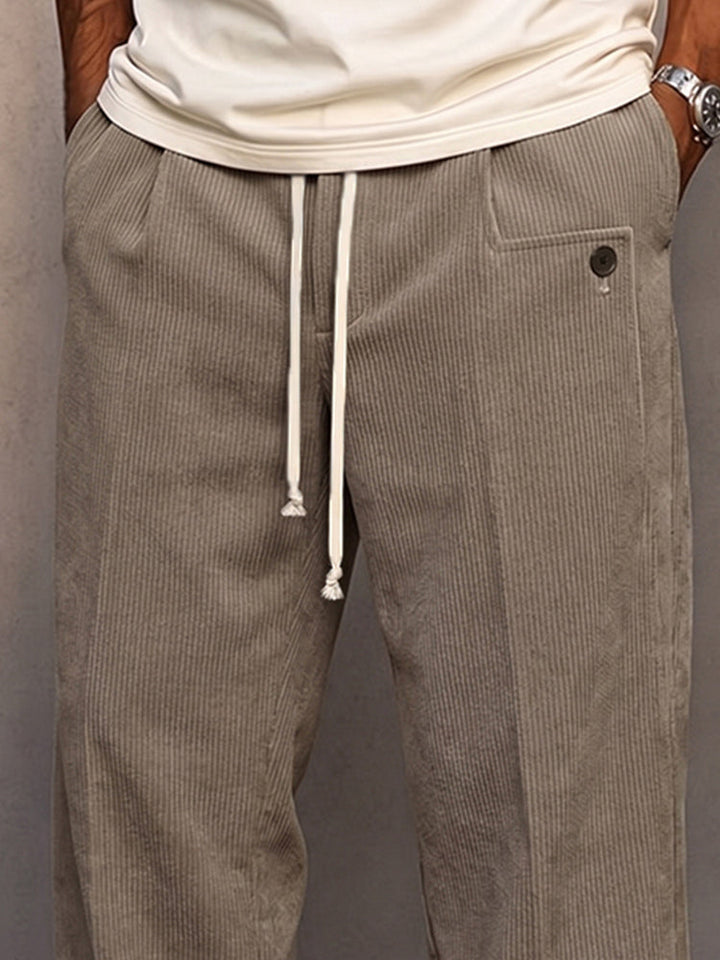 Men's casual corduroy trousers showing the straight-leg cut