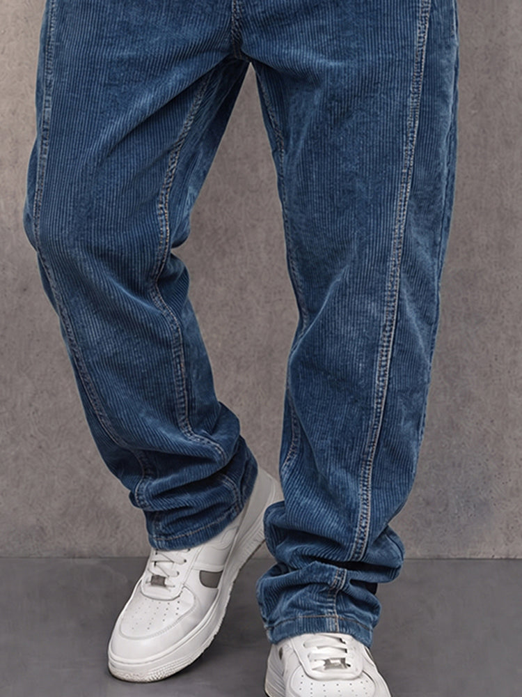 Side view of men's corduroy straight-leg trousers showing the straight fit