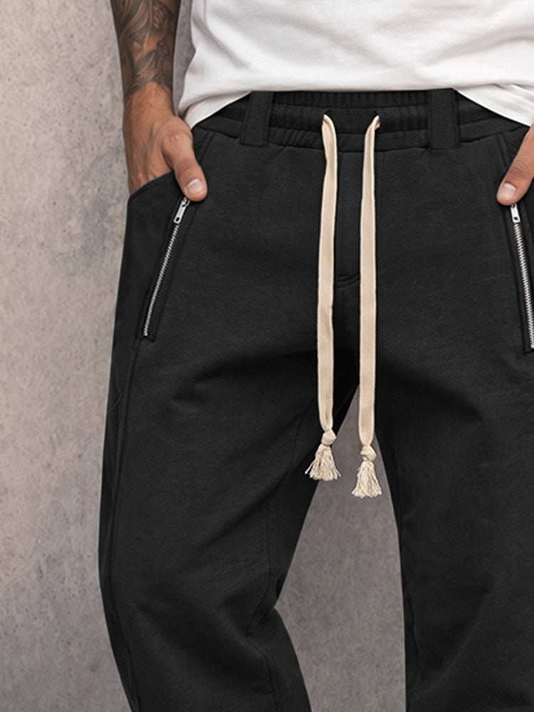 Side view of men's athleisure jogger trousers with a relaxed fit