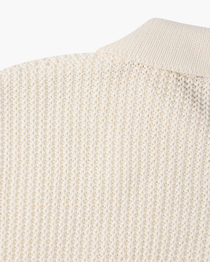 Men's cotton knit half zip jumper folded to show the collar and zip