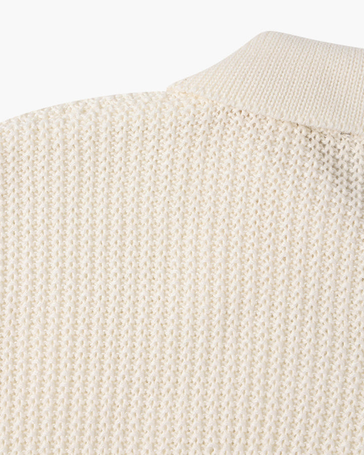 Men's cotton knit half zip jumper folded to show the collar and zip