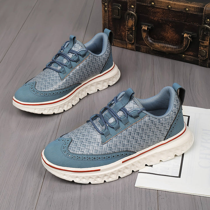 Men's brogue sneakers presented as a matching pair