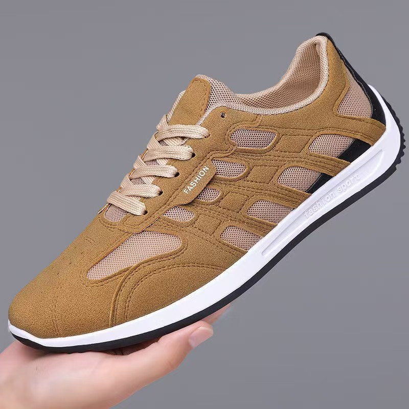 Pair of men's suede sneakers viewed from above