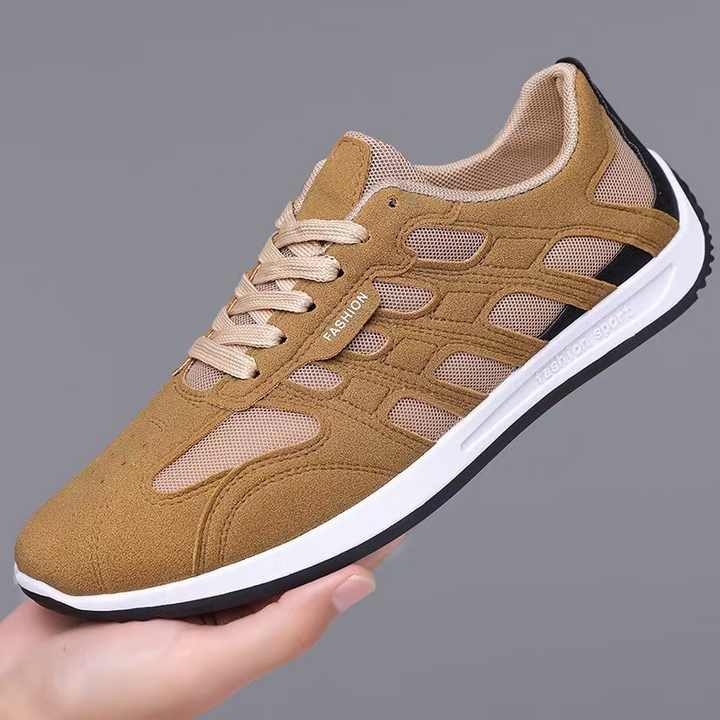 Pair of men's suede sneakers viewed from above