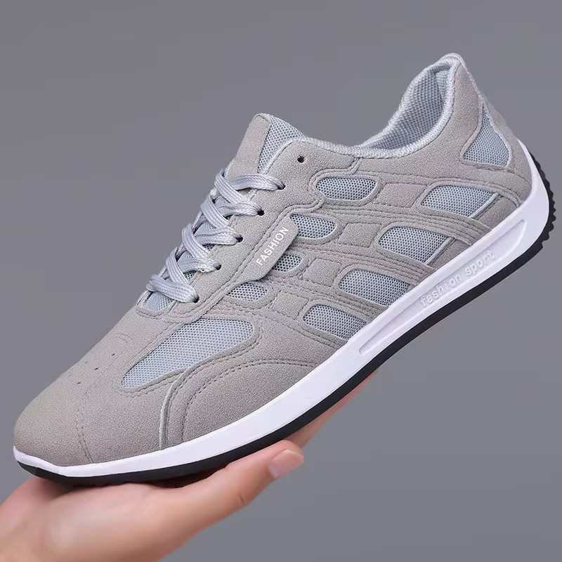Side profile of casual men's suede sneakers