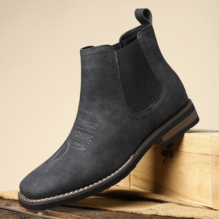 Side view of classic leather boots for men