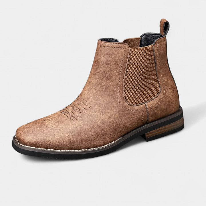 Detail of the laces and eyelets on classic leather boots
