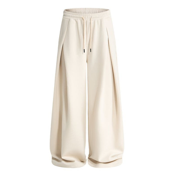 Side view of men's pleated joggers with a casual silhouette