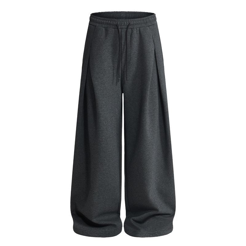 Close-up of the pleated front on men's baggy joggers