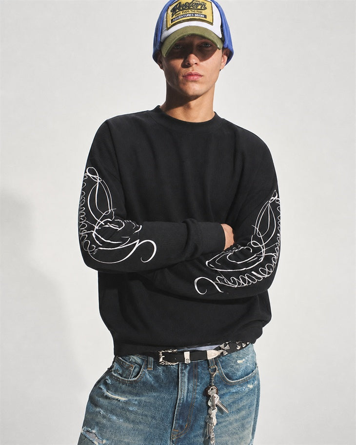 Men's embroidered leopard print sweatshirt shown from the front