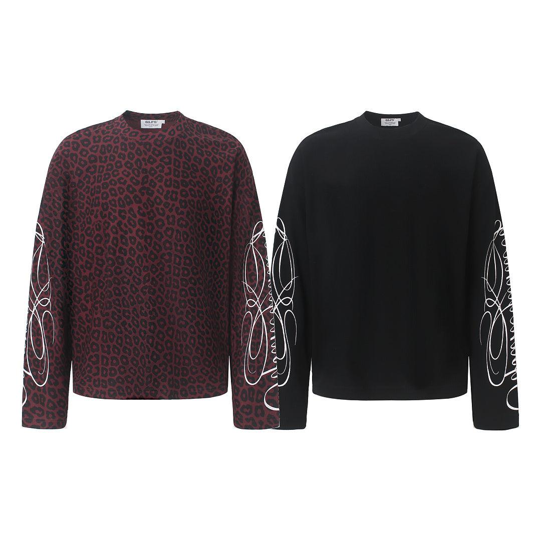 Detail of the ribbed cuff on the embroidered sweatshirt sleeve