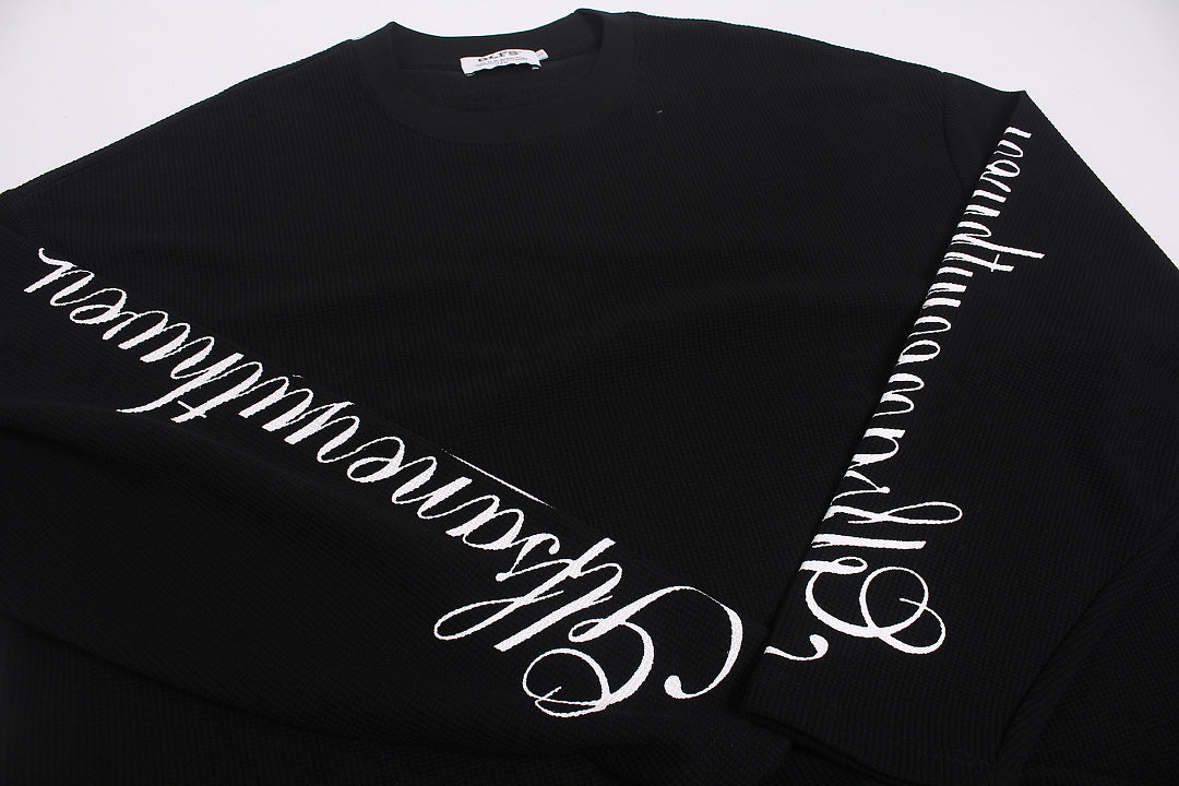 Close-up view of the sweatshirt fabric and leopard print embroidery